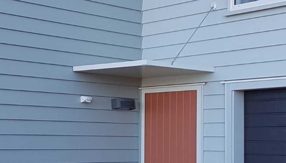 Corner entrance canopy over front door
