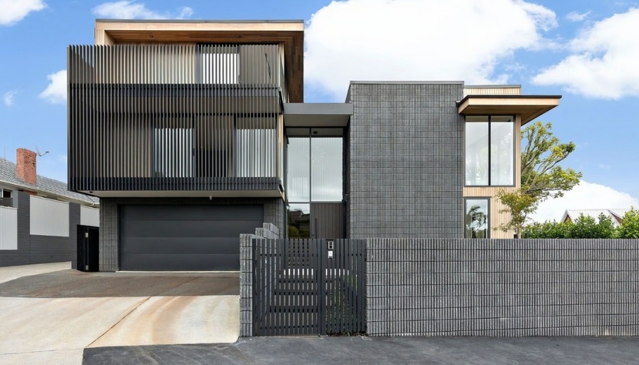 Vertical fixed louvres for shade and privacy