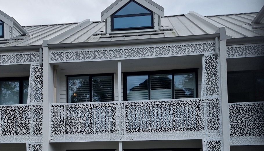Terraced housing with dapple screens
